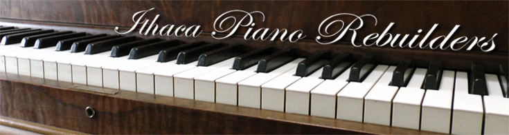 Piano keyboard with Ithaca Piano Rebuilders name superimposed over it